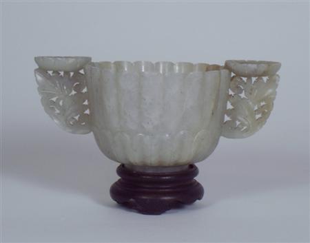 Appraisal: A Chinese grey jade bowl of ribbed circular section with