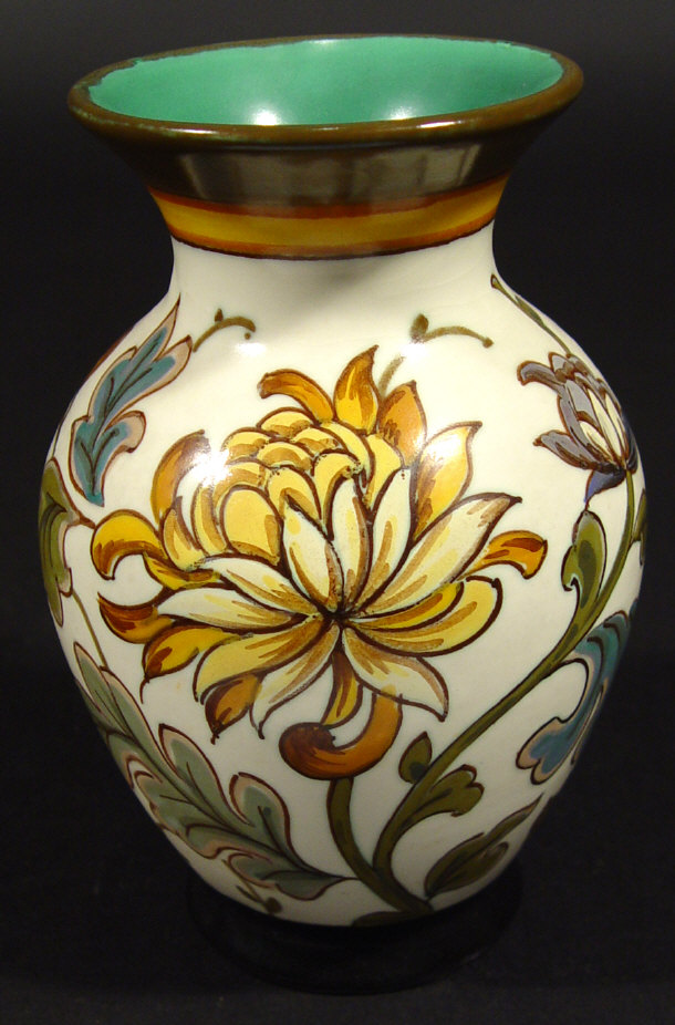 Appraisal: Gouda baluster vase hand painted with chrysanthemums onto a white