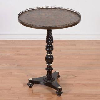 Appraisal: Continental ebonized wood tripod table th c round galleried top