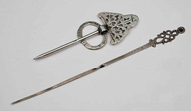 Appraisal: A SILVER GAME BIRD SKEWER with pierced and chased handle