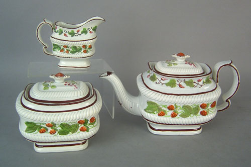 Appraisal: Pearlware tea service th c with relief strawberry decoration to