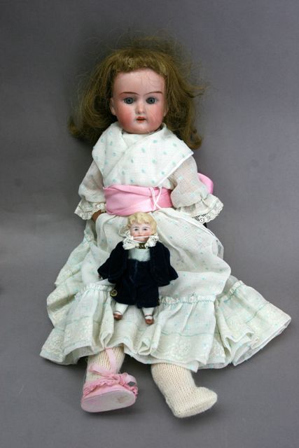 Appraisal: An Armand Marseille Floradora doll of cabinet size with bisque