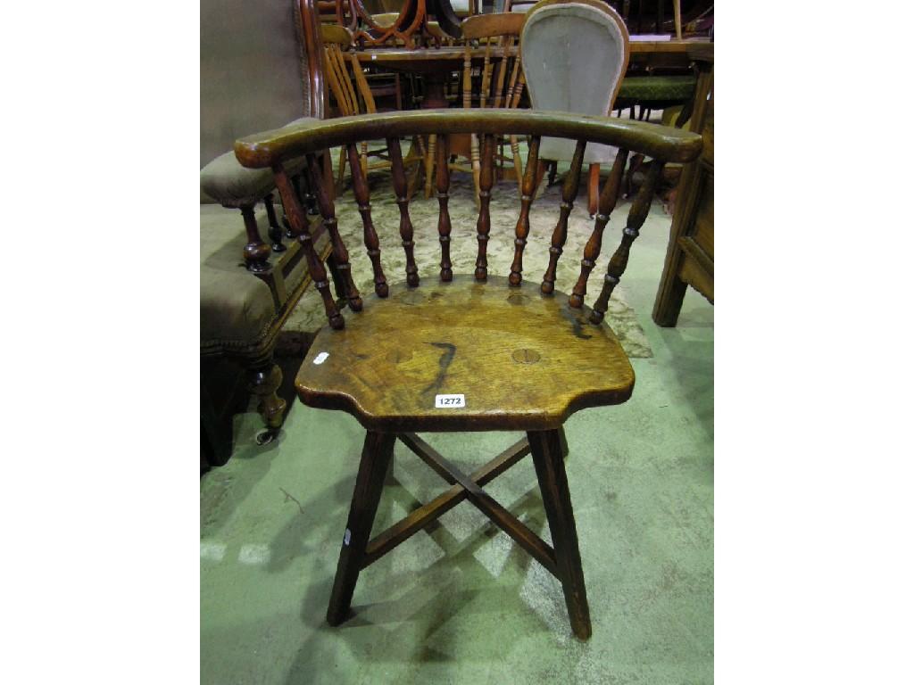 Appraisal: An oak country made occasional chair with bowed turned spindle