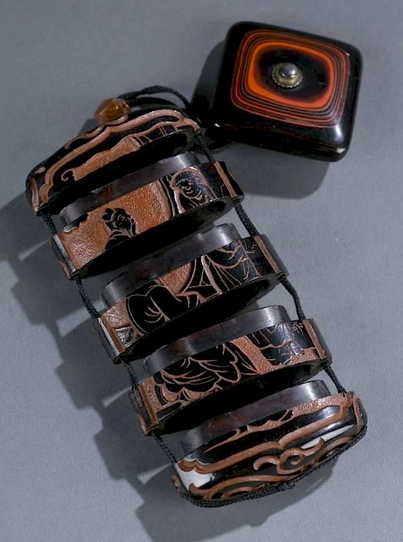 Appraisal: A lacquer inro and manju netsuke A lacquer inro and