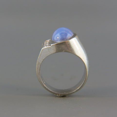 Appraisal: Diamond Star Sapphire Ring blue cabuchon synthetic sapphire with four