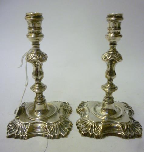 Appraisal: A PAIR OF TAPERSTICKS maker Garrards London in George I