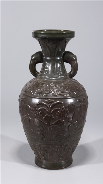 Appraisal: Chinese black glaze vase with molded handles and floral designs