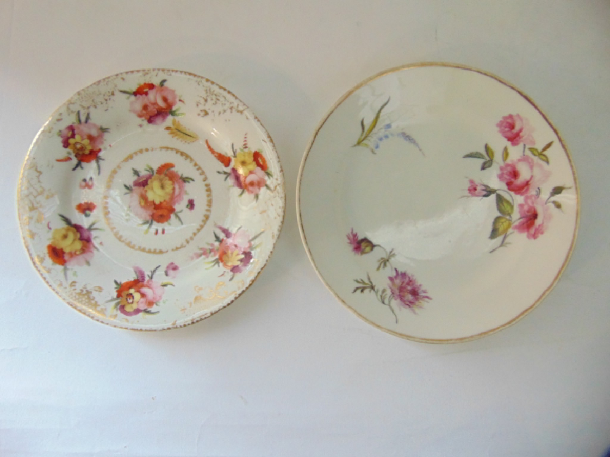 Appraisal: An early th century Swansea dessert plate with painted rose