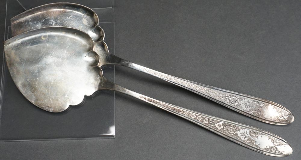 Appraisal: PAIR PERSIAN -SILVER SPADE-TIPPED SERVERS L IN CM OZTPair Persian