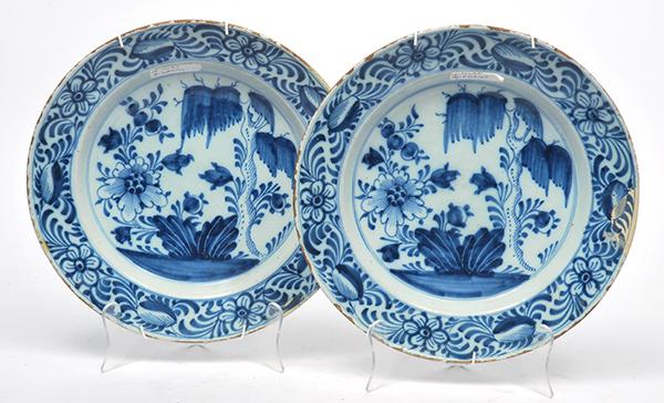 Appraisal: A PAIR OF DELFT BLUE AND WHITE PLATES each decorated