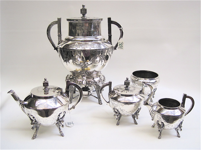 Appraisal: VICTORIAN SILVER PLATED TEA COFFEE SERVICE pieces with stag head