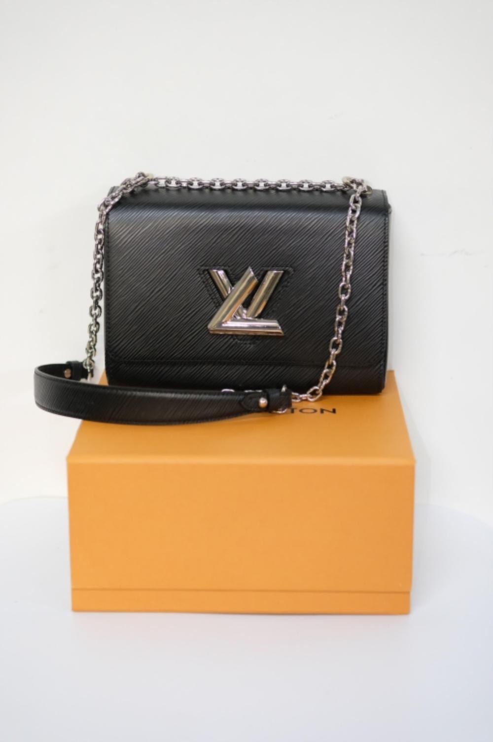 Appraisal: LOUIS VUITTON TWIST HANDBAG EPI LEATHER MM his Louis Vuitton