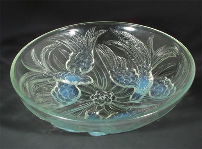 Appraisal: A large Jobling moulded opalescent glass bowl in low relief