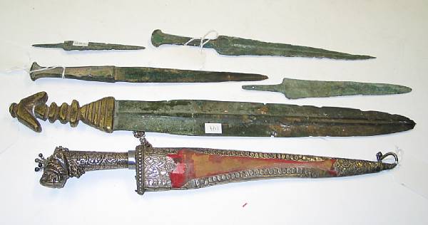 Appraisal: Six Asian metal daggers and unmounted blades Including one Indian