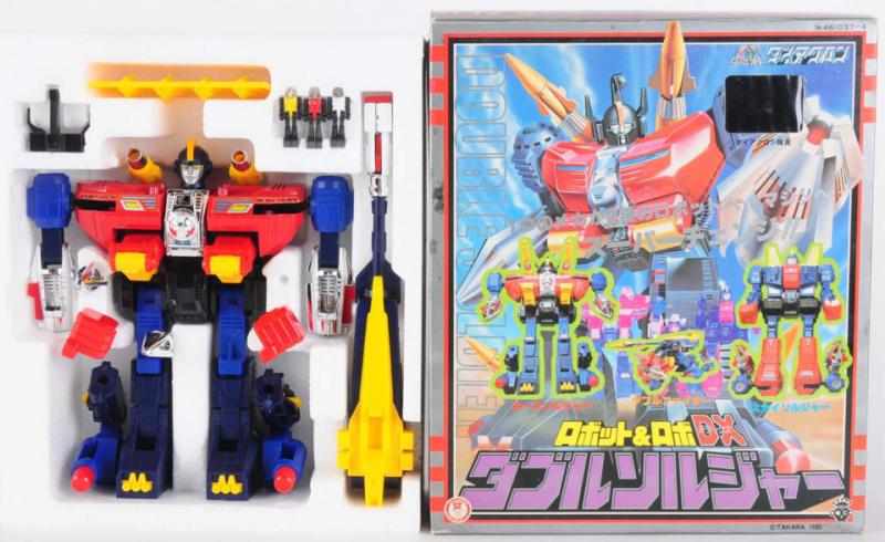 Appraisal: DX Double Soldgier Takara Very difficult to find toy with