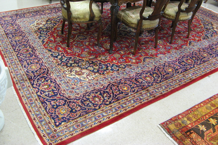 Appraisal: PERSIAN NAJAFABAD CARPET floral and central floral medallion design on