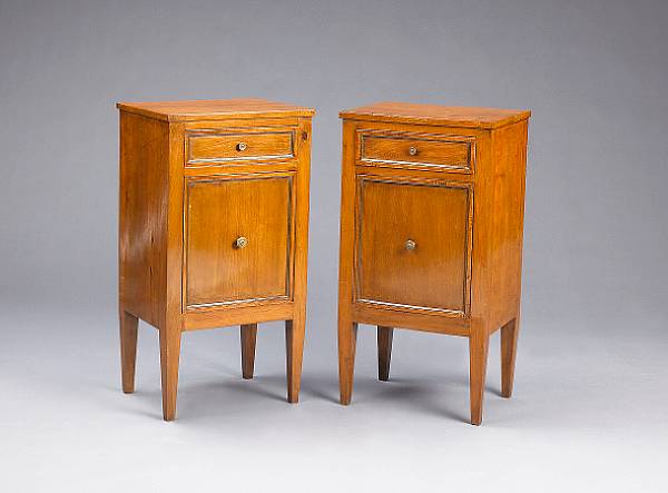 Appraisal: A pair of Continental Neoclassical fruitwood side cabinets early th