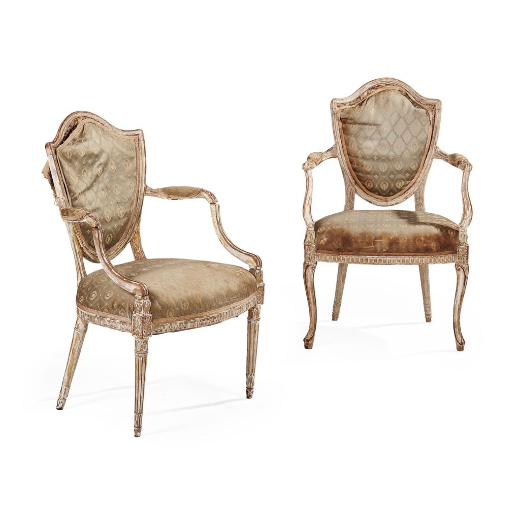 Appraisal: PAIR OF PAINTED GEORGE III HEPPLEWHITE ARMCHAIRS CIRCA the shield