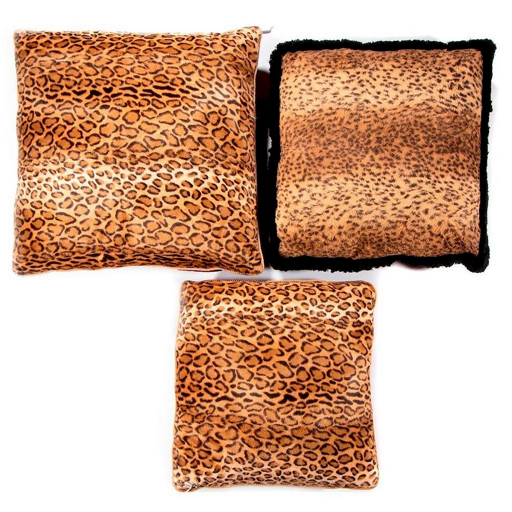 Appraisal: Three pillows Three faux leopard skin pillows Largest inches square