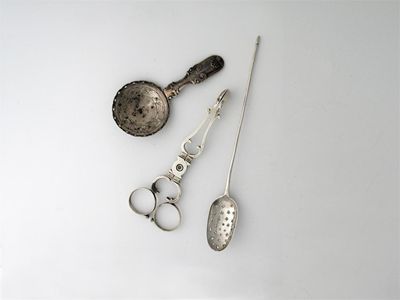 Appraisal: A George III caddy spoon the circular bowl with pierced