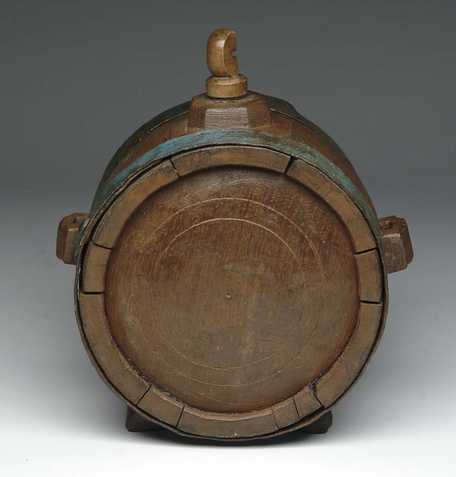 Appraisal: TURNED WOOD CANTEEN - diameter - wide The carrying strap