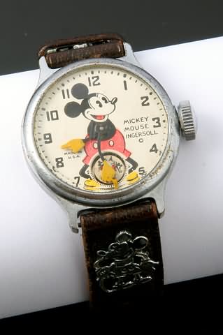 Appraisal: Original leather band with metal Mickey Mouse emblems c operating