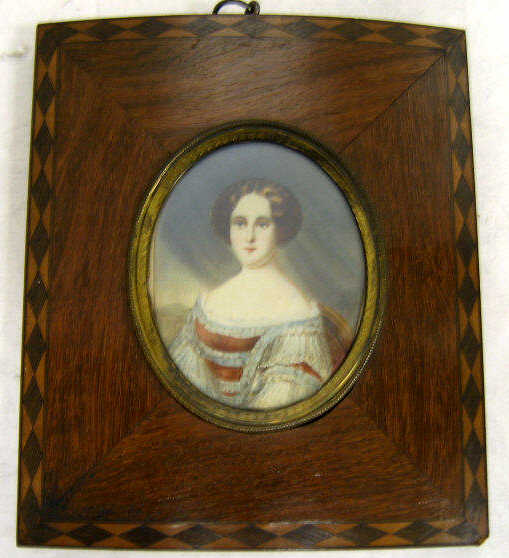 Appraisal: MINIATURE PORTRAIT OF A LADY Seated in a chair wearing