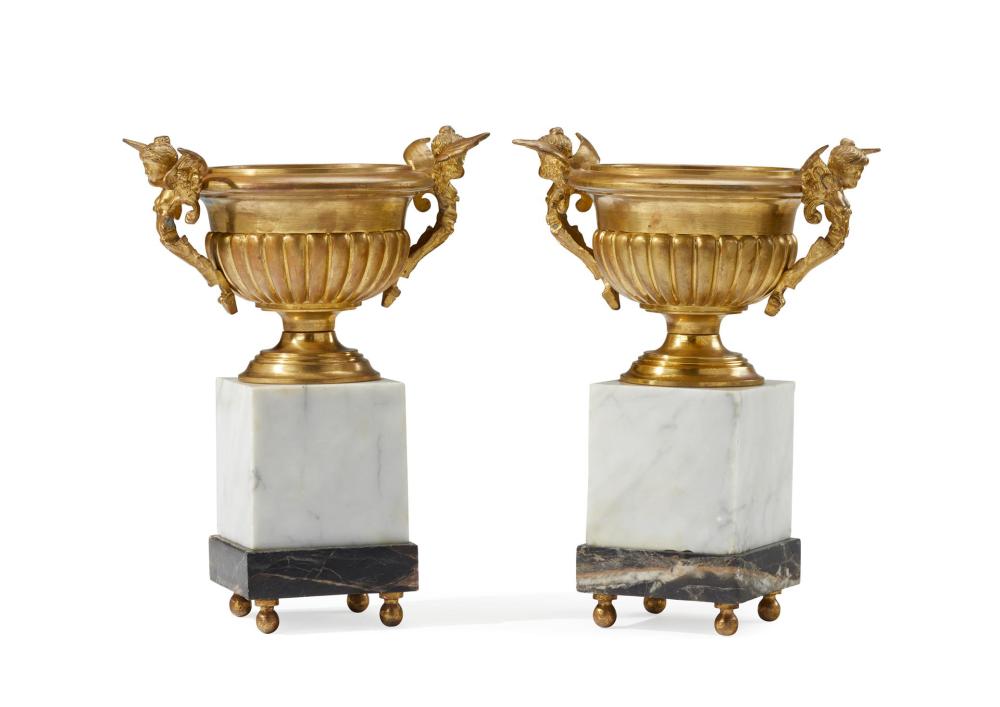 Appraisal: A pair of gilt-bronze and marble garniture urns th Century