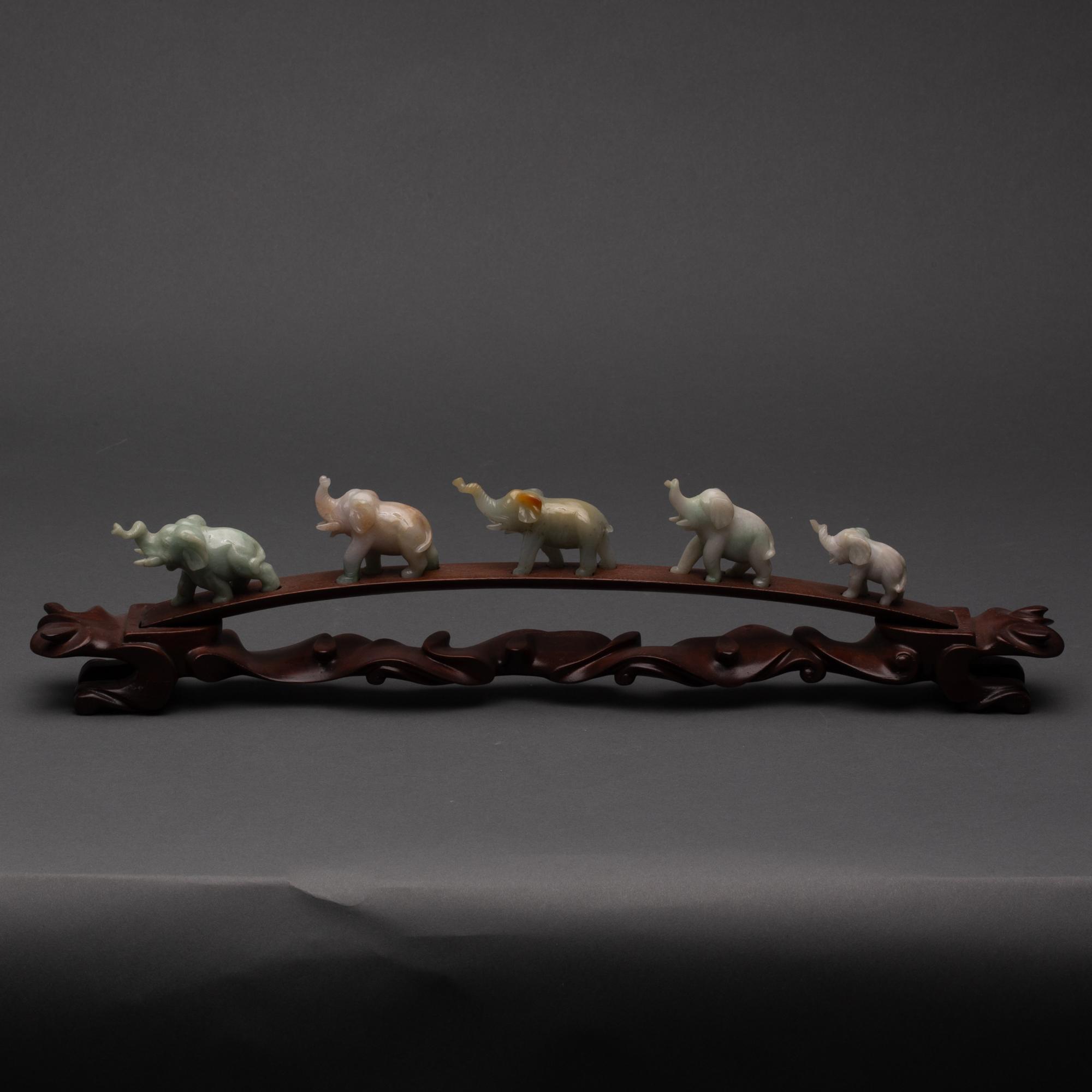 Appraisal: FIVE CHINESE JADE ELEPHANTS TH CENTURY Procession of five Jadite