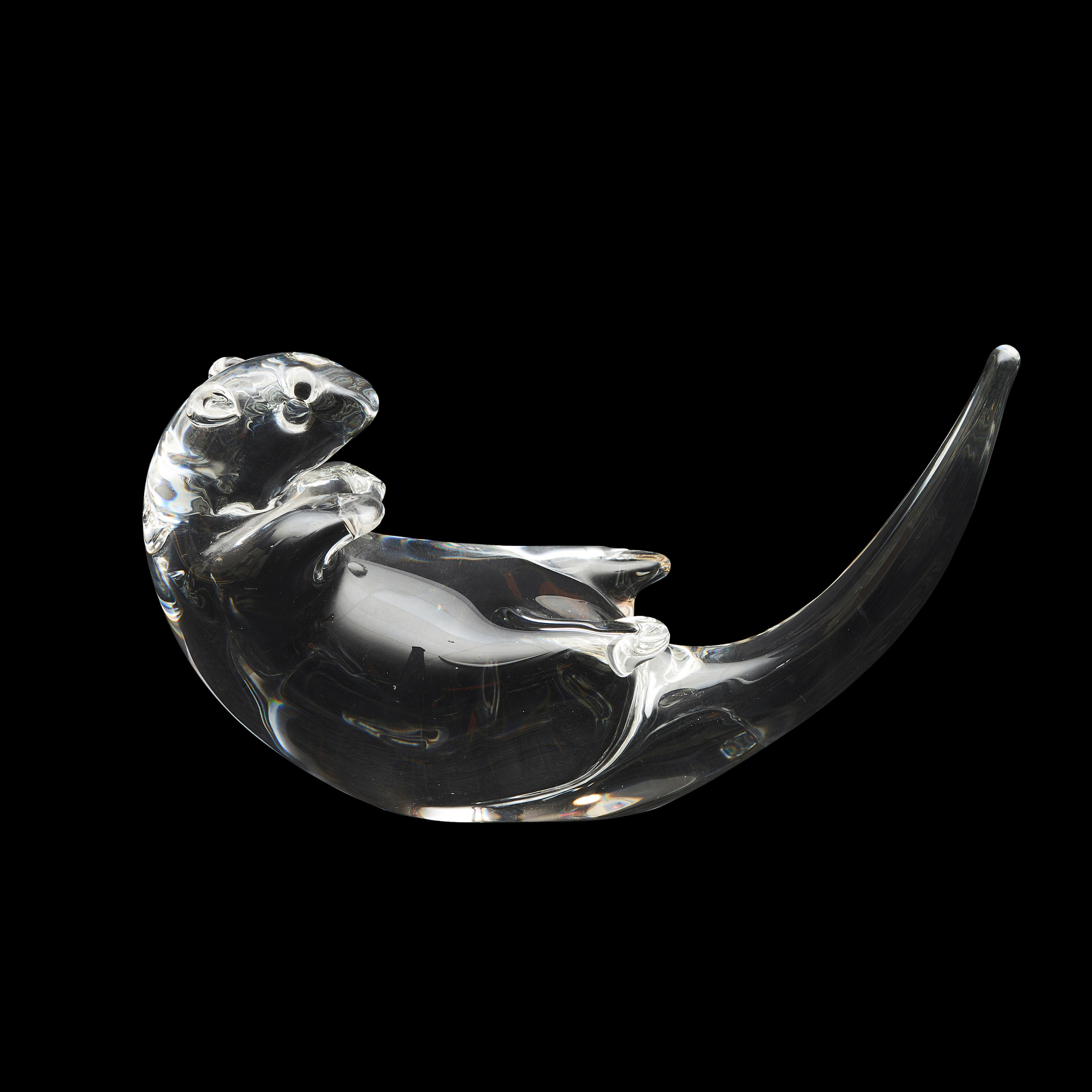 Appraisal: STEUBEN COLORLESS GLASS OTTER depicting an otter on their back