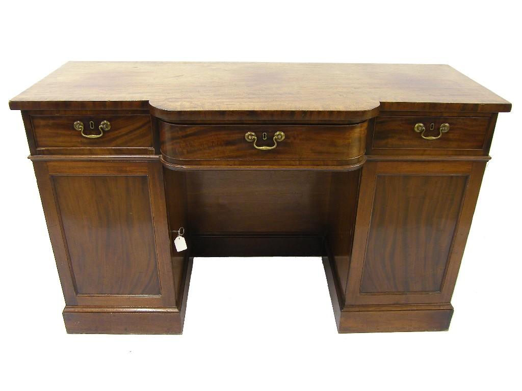 Appraisal: th century mahogany breakfront pedestal sideboard the crossbanded top over