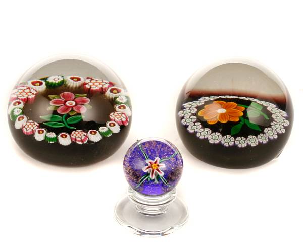 Appraisal: A group of three glass paperweights and the first is