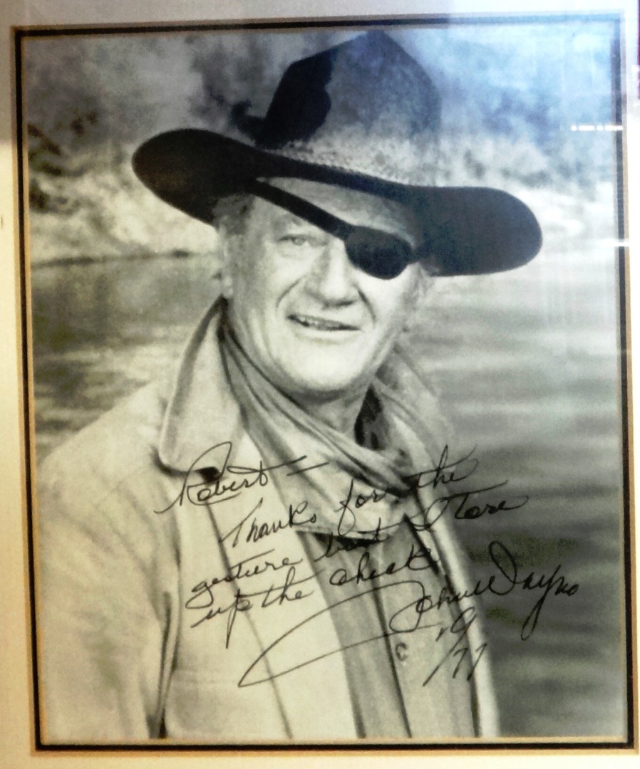 Appraisal: JOHN WAYNE - Studio Publicity Photograph x ins within mount