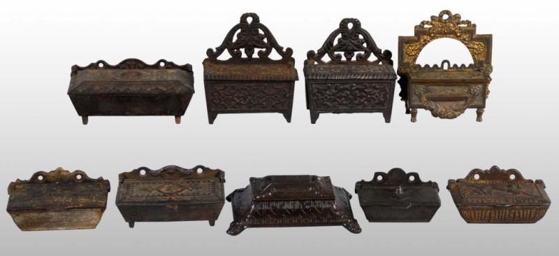 Appraisal: Lot of Cast Iron Lidded Match Vesta Holders Description Casket-style