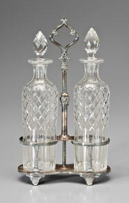 Appraisal: Decanter set with frame pair matching cut glass decanters with