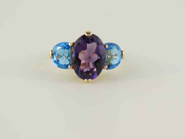 Appraisal: Amethyst Blue Topaz Ring rich oval carat amethyst with a