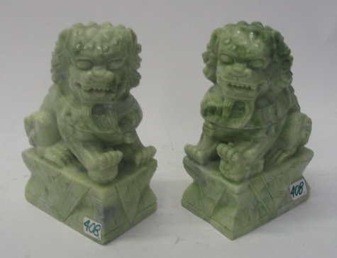 Appraisal: PAIR OF CHINESE JADE CARVED FOO DOG BOOKENDS opposing each