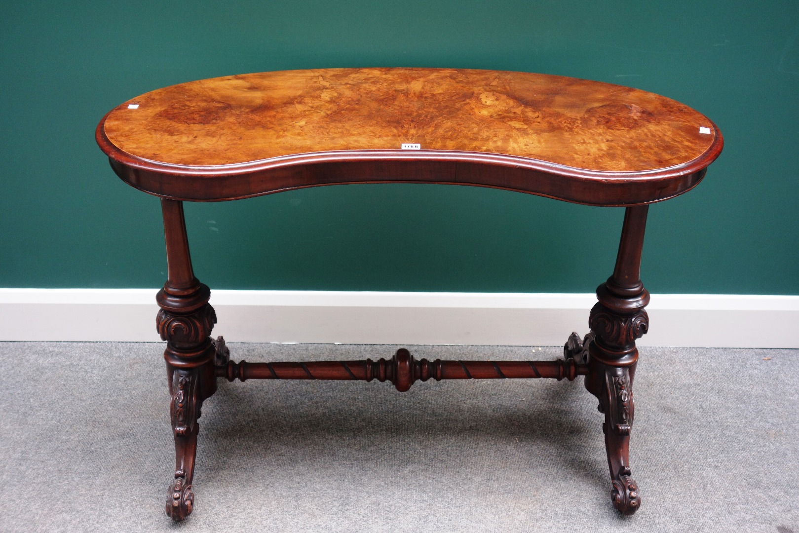 Appraisal: A Victorian figured walnut kidney shaped writing table the pair