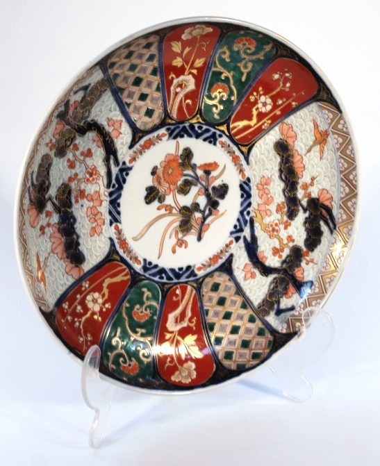 Appraisal: A thC Imari pottery charger the circular body polychrome decorated