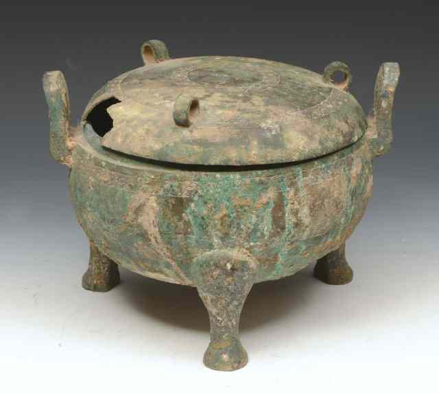 Appraisal: A CHINESE BRONZE ARCHAIC FORM INCENSE BURNER DING and cover