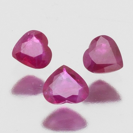 Appraisal: THREE UNMOUNTED CT TOTAL HEART CUT BURMA RUBY GEMSTONES Three