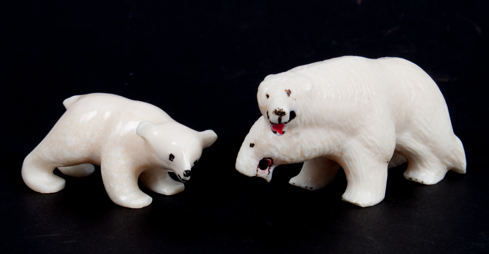 Appraisal: Two Inuit carved walrus ivory polar bears carved group of