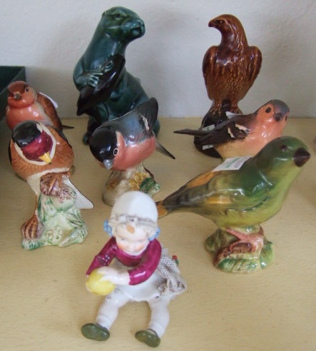 Appraisal: Five various Beswick English songs birds a Poole seal a