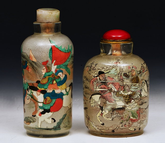 Appraisal: A BEIJING GLASS SNUFF BOTTLE of cylindrical form the interior