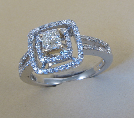 Appraisal: DIAMOND AND FOURTEEN KARAT GOLD RING white gold and set