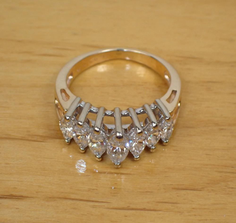 Appraisal: DIAMOND AND FOURTEEN KARAT TWO-TONE GOLD RING The k yellow