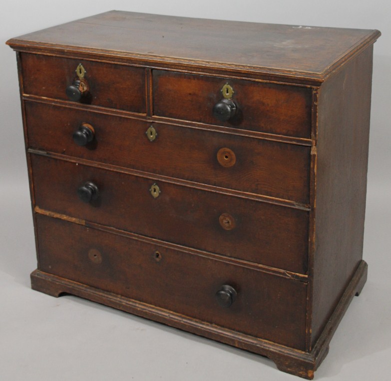 Appraisal: An thC oak chest of two short and three long