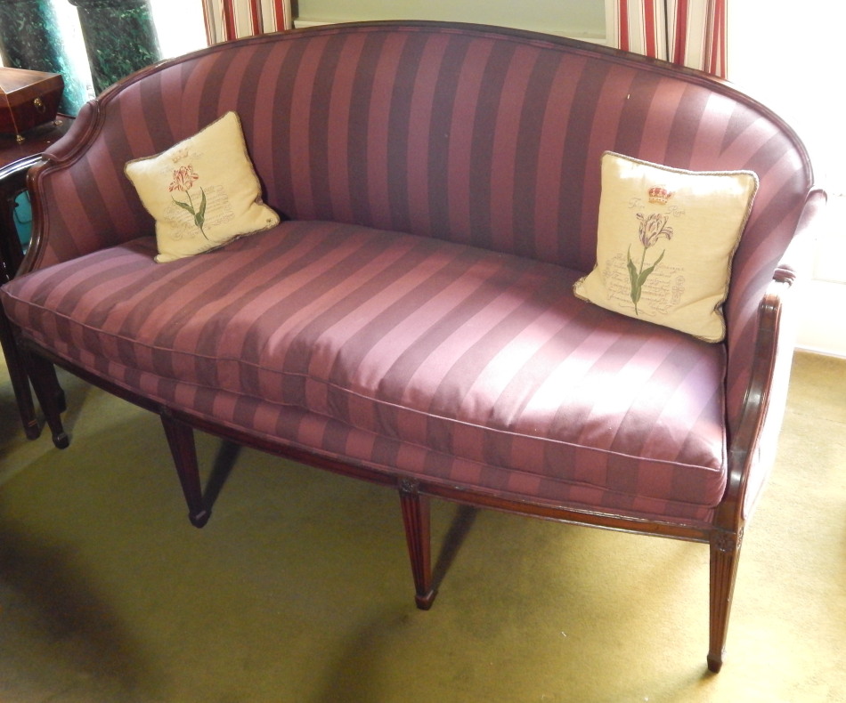 Appraisal: A thC mahogany show frame sofa with striped upholstery and