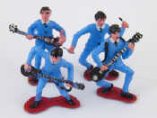 Appraisal: A set of four figures of the Beatles apparently in