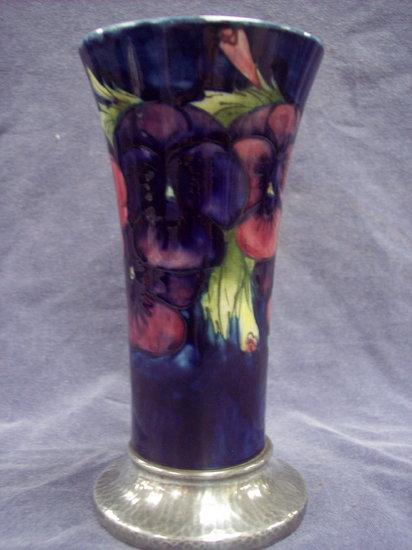 Appraisal: A Pansy pattern vase of blue ground the tapering cylindrical